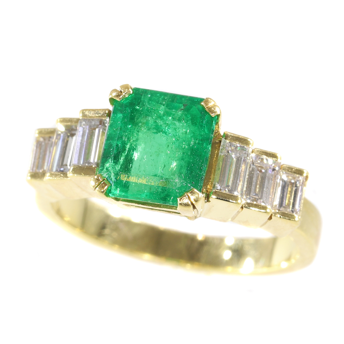 Vintage French estate ring with high quality Colombian emerald and baguette diamonds